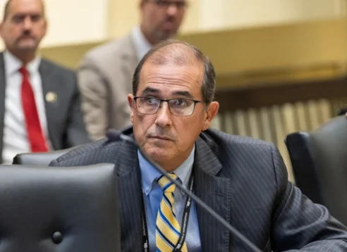 Tom Gann speaking during a public appearance